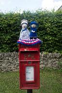 Queenie on a postbox