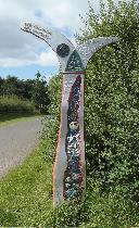 Sustrans signpost to Amble