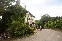 30.05.25 Marcus and Michelle Benton pass the Black Horse pub on Tandem National 2025