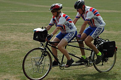 Alan stoking with wife Mary piloting their tandem