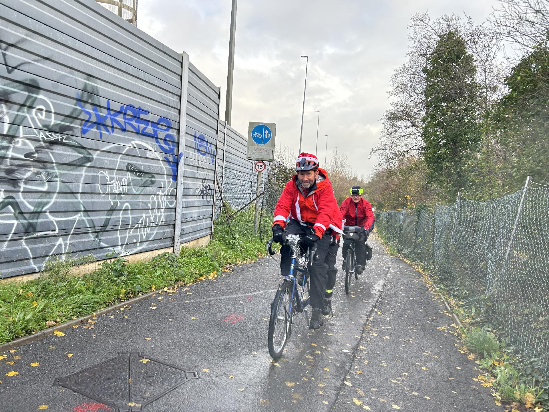 Stuart and Jackie heading over the long bridge over River Avon, very windy