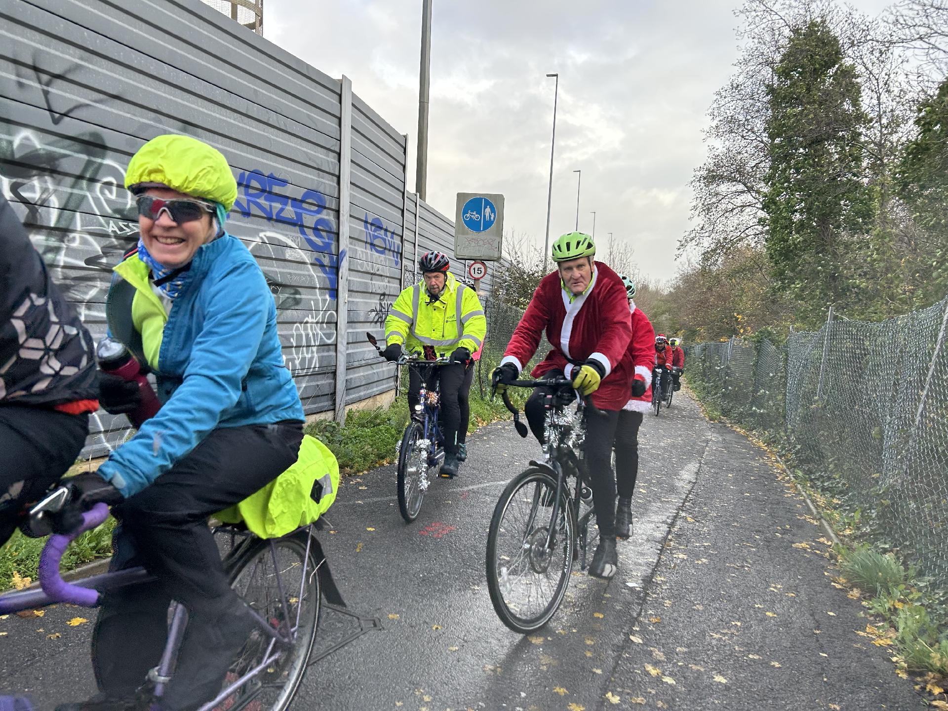 Peter and Jenny heading over the long bridge over River Avon, very windy